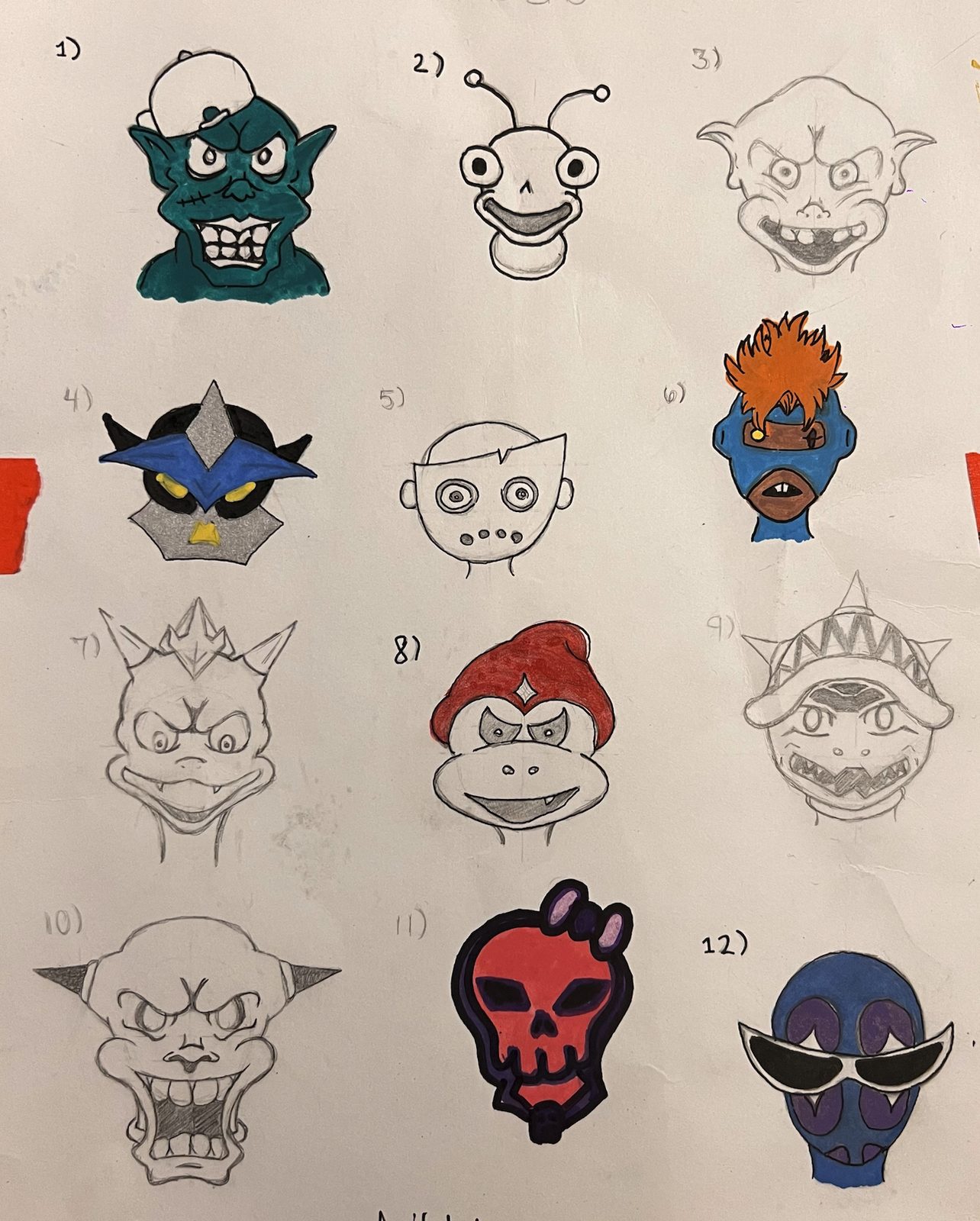 A sheet of twelve numbered cartoon character heads, some coloured in: goblins, skulls and masked faces