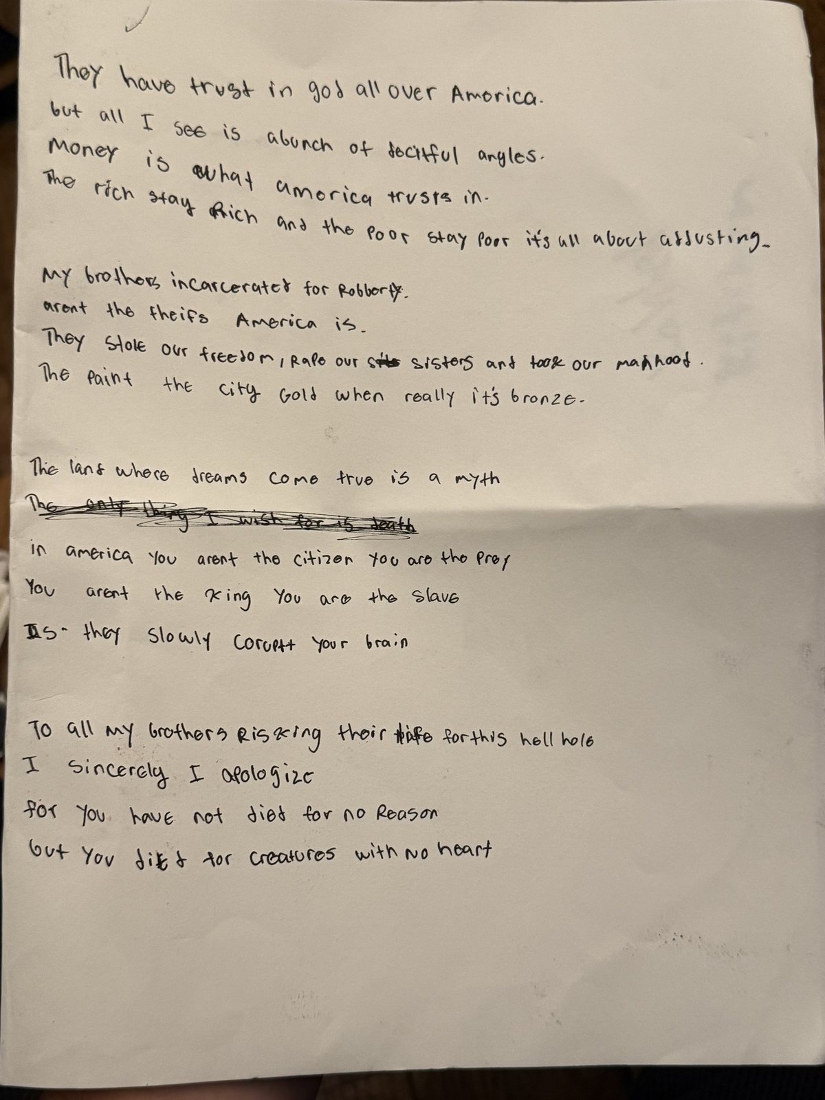 A handwritten poem beginning: They have trust in god all over America. But all I see is a bunch of deceitful angels