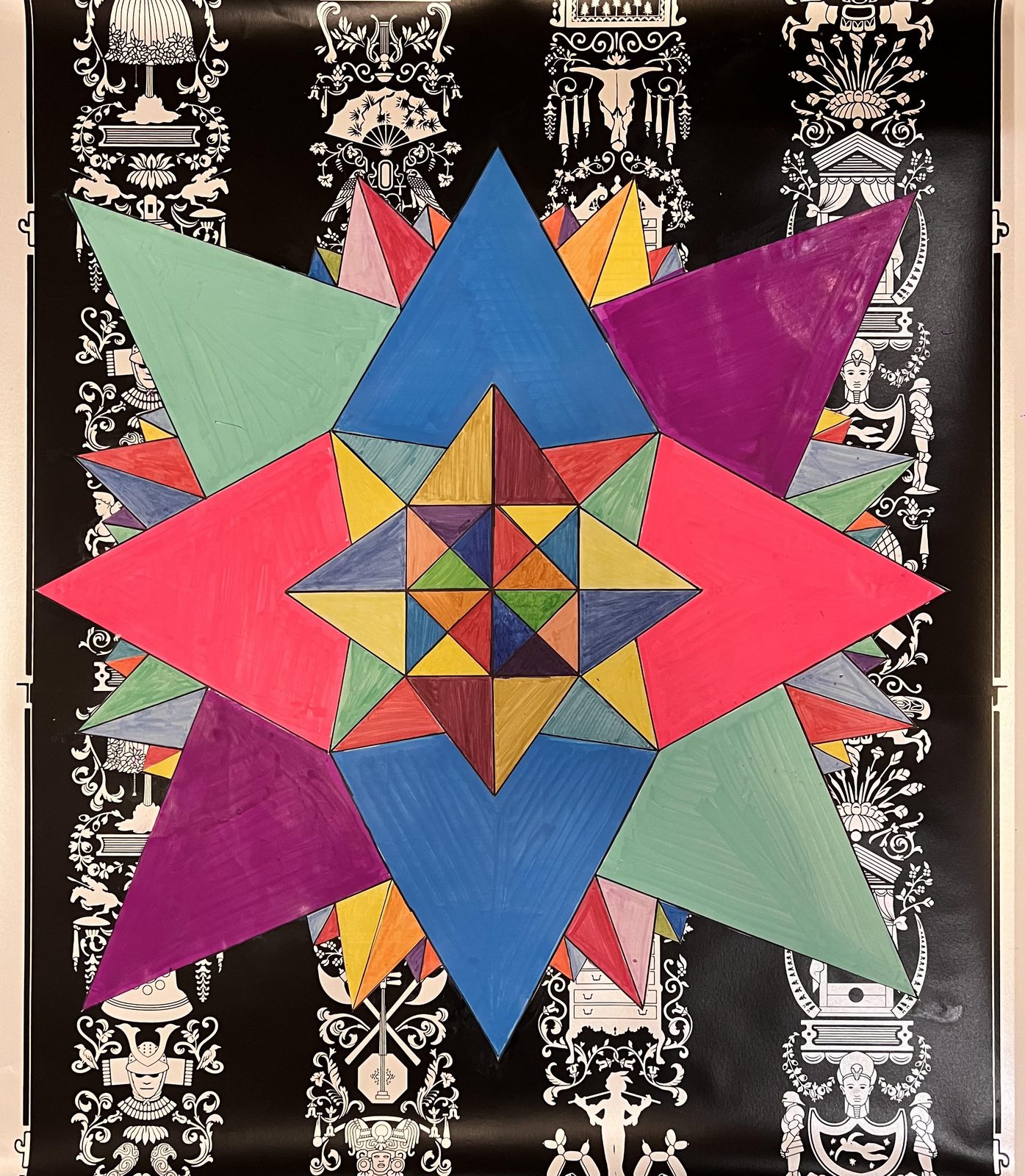 A geometric star of overlapping triangles in pink, blue, green and orange, layered over a patterned black and white ground